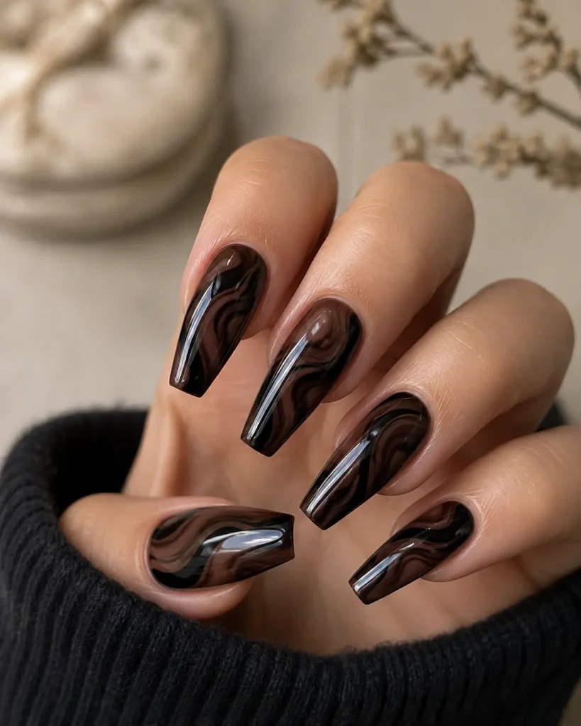 dark brown and black swirl nails